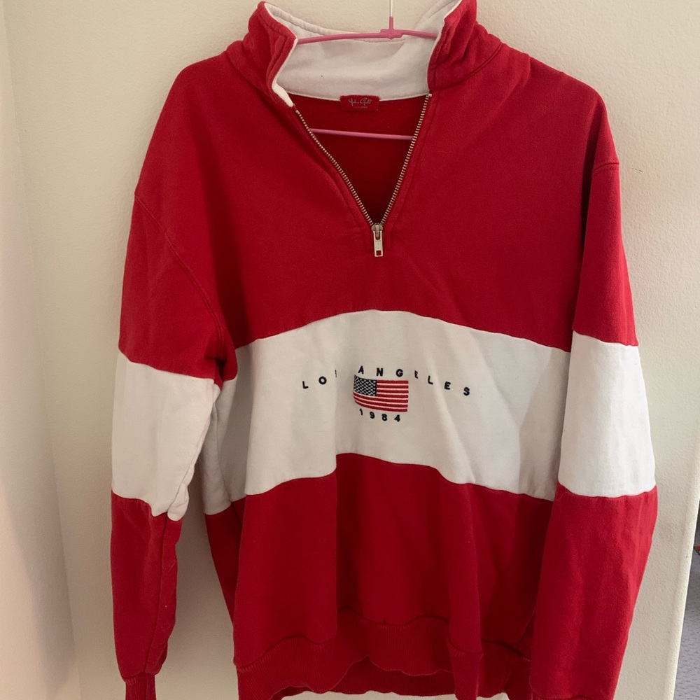 Red and white “Los Angeles” sweater from Brandy
